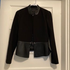 Contemporary black blazer with zipper and faux leather details